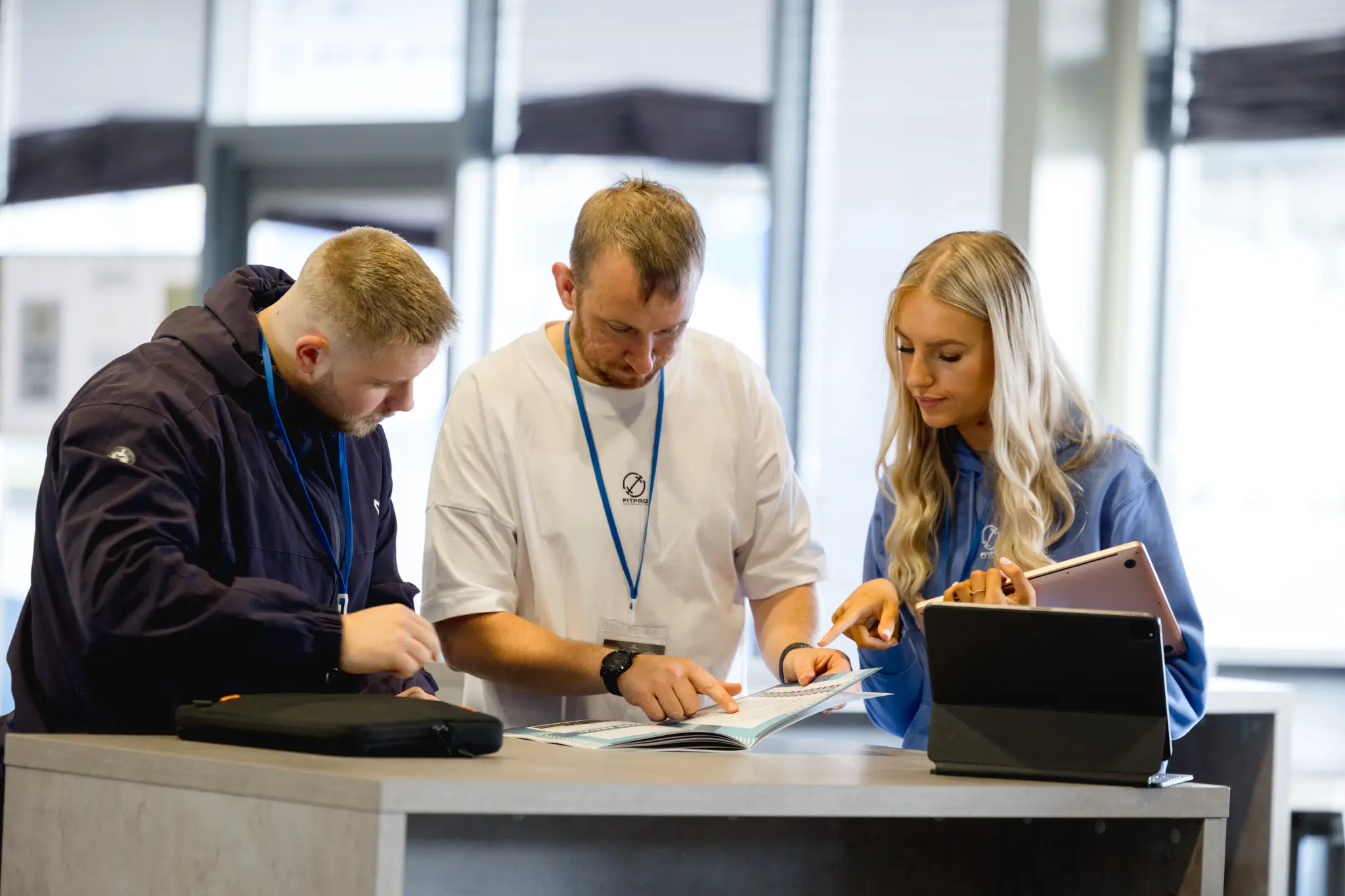 FitPro team reviewing campaigns